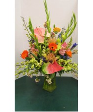 Tropical Arrangement, Greens, blues and pinks- ANTHIRIUM NOT AVAILABLE, ORCHID COLORS WILL VARY