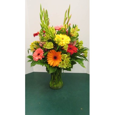 Vase Arrangement with Yellows, Oranges, Reds and Green 